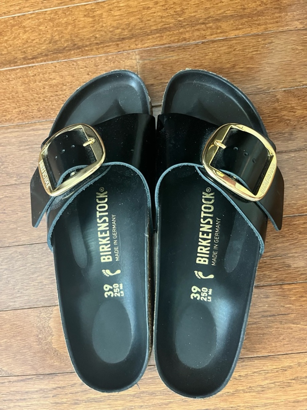 Birkenstock Black Single-Strap Sandals with Gold Buckles - Picture 3 of 5